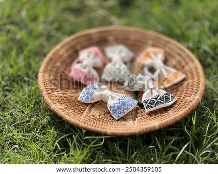 Similar – Image, Stock Photo Wool bands / wool rings for controlling oak processionary moths on an oak tree