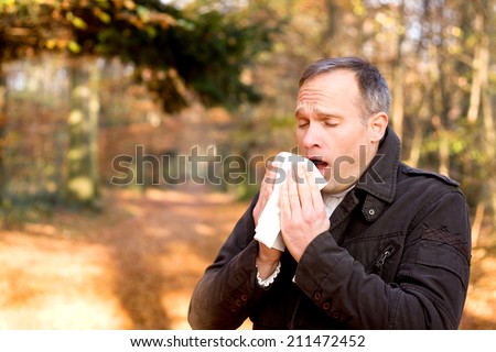 Man is sneezing
