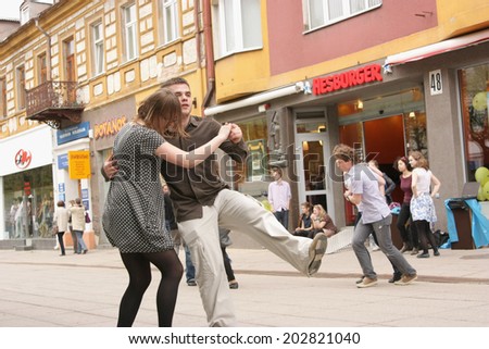 KAUNAS, LITHUANIA - MAY 01: Young lindy hop dancers in pedestrian street during Street Music Day on May 01, 2010 in Kaunas, Lithuania