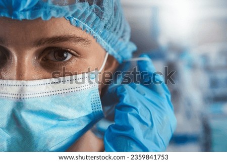 Similar – Image, Stock Photo hard working female doctor, heath care worker with face shield and mask in black and white