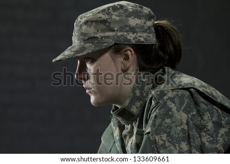 Young army woman dealing with Post Traumatic Stress Disorder