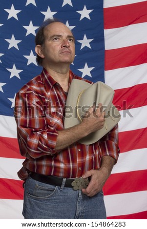Cowboy takes off hat (patriotic), vertical