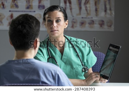 Female doctor consulting with patient in a medical setting