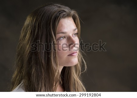 Young woman looking to her left