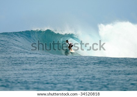 Surfer in barrel getting tube view, Mentawai Islands, Indonesia