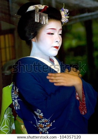KYOTO, JAPAN - MAY 14: Maiko in kimono performs in a Geisha House May 14, 2012 in Kyoto, Japan. Maiko is a geisha apprentice, a popular form of Japanese entertainment, left from the medieval times.