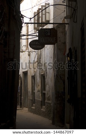 STONE TOWN - JANUARY 21 :Narrow alley at 21 January, 2011. Stone Town, Zanzibar. Stone Town is listed as UNESCO World Heritage site.