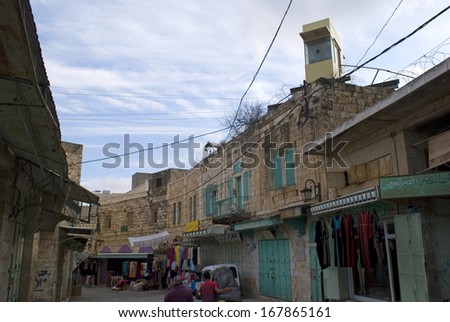 HEBRON, PALESTINA - DECEMBER 7: Old town on December 7, 2013, Hebron, Palestina. The Muslim quarter in Hebron has a real Arabic old town feeling with its bazaar.
