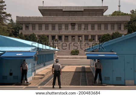PANMUNJOM, SOUTH KOREA - MAY 17: Korean soldiers in the Joint Security Area on May 17, 2014 in Panmunjom, South Korea. The armistice agreement was signed in 1953 which divided Korea in two parts.