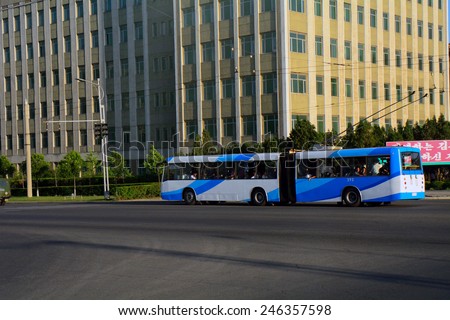 NORTH KOREA, PYONGYANG - JUNE 13: City bus at June 13, 2014 in Pyongyang, North Korea. Pyongyang receives new and modern buses from China.