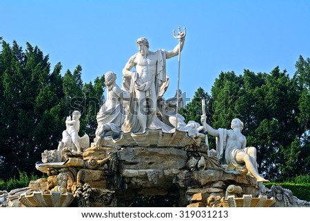 VIENNA - AUGUST 10 : Neptune Fountain at Schonbrunn Palace at 21 August 2015 in Vienna, Austria. Schonbrunn is the former home of the Habsburgs.