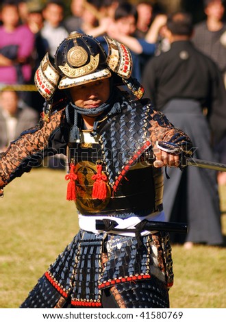 TOKYO, JAPAN - NOVEMBER 3: A Samurai ready to fight during a festival of the birthday of Emperor Meiji, November 3, 2009 in Tokyo, Japan.