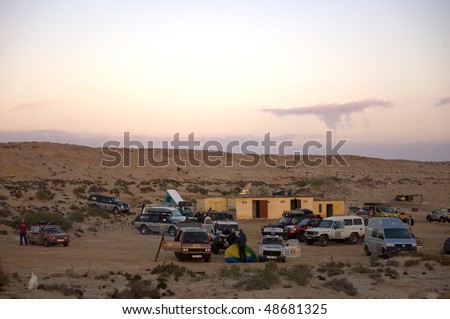 WESTERN SAHARA - JANUARY 2: Participants of Budapest - Bamako Rallye are leaving their campsite in the morning at January 2, 2006 in Western Sahara
