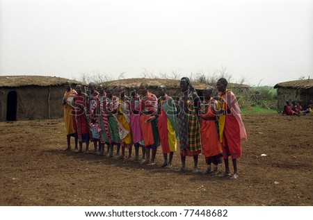 MAASAI MARA, KENYA - FEBRUARY 4: Maasai women in the village, 4 February , 2004 at Masaai Mara, Kenya. The Maasai are the most famous tribe in Africa. They are nomadic and live in small villages.