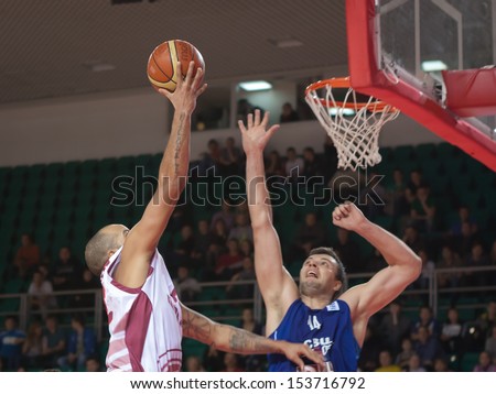 SAMARA, RUSSIA - DECEMBER 05: Andre Smith of BC Krasnye Krylia throws a ball in a basket during a game against BC CSU Asesoft Ploiesti on December 05, 2012 in Samara, Russia.