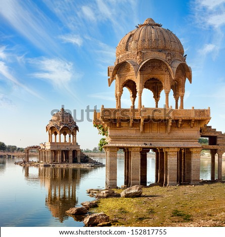 Gadi Sagar (Gadisar) Lake is one of the most important tourist attractions in Jaisalmer, Rajasthan, North India.   	 Artistically carved temples and shrines around The Lake Gadisar Jaisalmer.