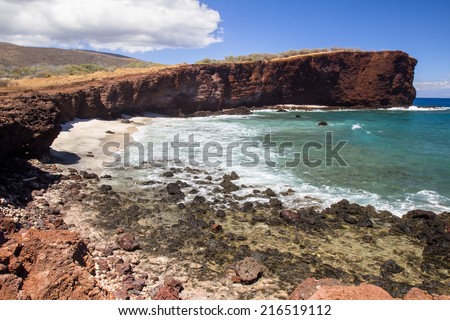 Waves crash on the beach in Shark\'s Cove in Lanai