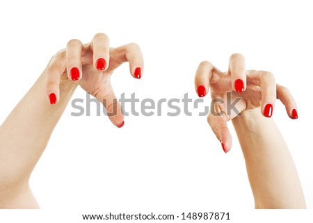 Aggressive girl hands with long red nails.  Isolated on white background