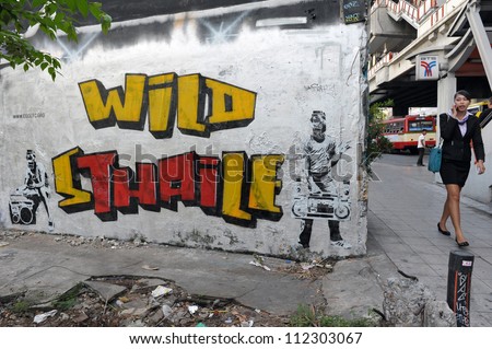 BANGKOK - MARCH 5: Graffiti piece by London based artist Codefc on a wall in central Bangkok on March 5, 2012 in Bangkok, Thailand. Codefc\'s art can be seen on walls in many asian and european cities.
