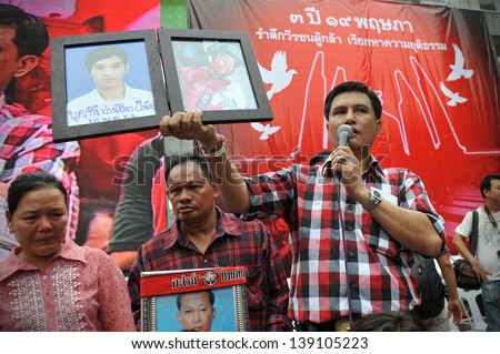 BANGKOK - MAY 19: Relatives of red shirts killed in anti-government clashes join a large rally on May 19, 2013 in Bangkok, Thailand. Red shirts gathered in remembrance of those killed in protests.