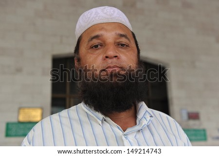 HAT YAI - MAY 16: An unidentified man attends Masjid Pakistan or Pakistan Mosque on May 16, 2013. Masjid Pakistan was built in 1937 in Hat Yai\'s Pakistani community. Around 5% of Thais are muslim.