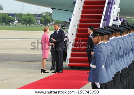 BANGKOK - NOV 18: US President Barack Obama is greeted by US Ambassador Kristie Kenney as he arrives in the Thai capital on a three-nation Southeast Asia tour on Nov 18, 2012 in Bangkok, Thailand.