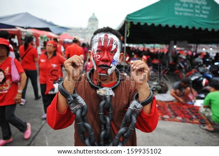 BANGKOK - JAN 29: Red Shirts gather on the Royal Plaza to protest against freedom of speech laws on Jan 29, 2013 in Bangkok, Thailand. Lese majeste is punishable with imprisionment of up to 15 years.