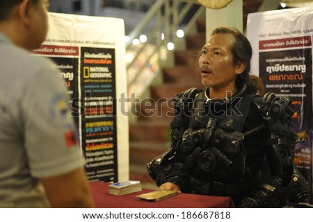 HUA HIN, THAILAND - FEB 21: An unidentified fortune teller gives a reading on a street on Feb 21, 2013 in Bangkok, Thailand. Street-side fortune tellers are commonplace in Thailand's towns and cities.