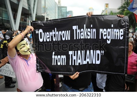 BANGKOK - JUNE 2: Anti-government protesters rally in Bangkok\'s shopping district on June 2, 2013 in Bangkok, Thailand. The protesters call for the government to be overthrown.
