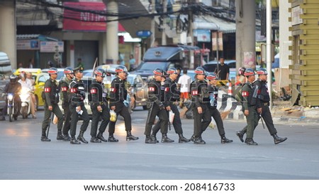 BANGKOK - MAY 30: Military police deploy on a city centre street following a military coup on May 30, in Bangkok, Thailand. The Thai capital is under martial law after Thailand\'s 19th coup d\'etat.