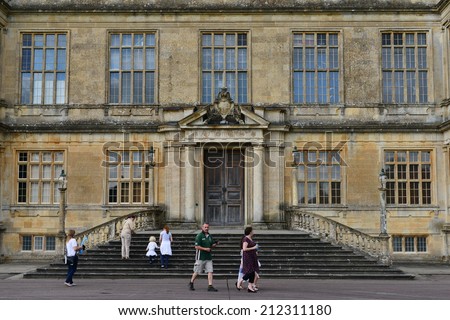 LONGLEAT - AUG 15: Unidentified tourists visit Longleat House on Aug 15, 2014 in Longleat, UK. Longleat is a popular tourist attraction, including a 16th century stately home, theme park and safari.