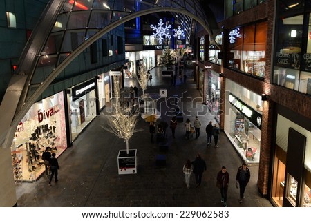 BRISTOL - NOV 7: People visit Cabot Circus shopping mall during the Christmas holiday shopping season on Nov 7, 2014 in Bristol, UK. The mall boasts 1,000,000 sq ft of retail and leisure outlets.