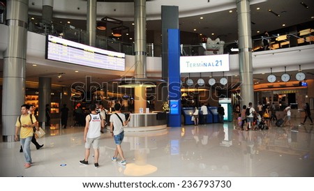 BANGKOK - JUN 7: People walk through Terminal 21 shopping mall on Jun 7, 2012 in Bangkok, Thailand. The world travel themed mall is home to many leading local and international chain stores.