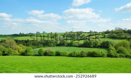 Scenic View of Rolling Countryside of Green Fields in the Avon Valley in Wiltshire England