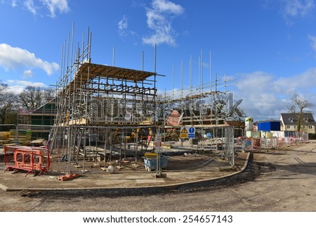 HILPERTON - FEB 21: View of a building site on Feb 21, 2015 in Hilperton, UK. The Wiltshire village is part of the UK\'s construction boom with the number of new homes being built up 10% since 2013.