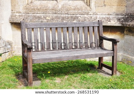 View of an Old Wooden Bench in a Park
