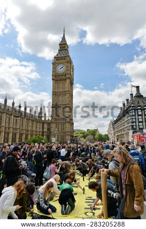 LONDON - MAY 30: Protesters rally against public sector spending cuts following the re-election of the Conservative party on May 30, 2015 in London, UK. The government plan severe austerity measures.