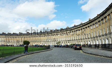 BATH - OCT 1: View of the Royal Crescent designed by architect John Wood the Younger in late 18th century on Oct 1, 2012 in Bath, UK. The Royal Crescent consists of 30 terraced Georgian Town Houses.