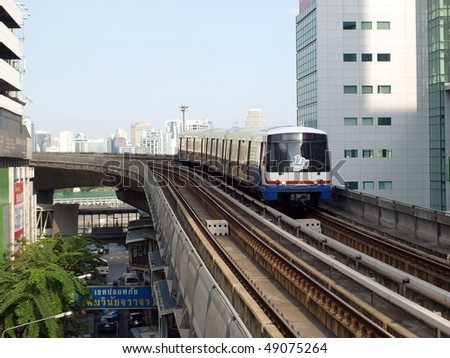 BANGKOK - FEB 7: BTS Skytrain approaches a station on Silom Road as the BTS rail network celebrates its 10th anniversary of operations in the Thai capital, Feb 7, 2010 in Bangkok, Thailand