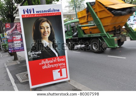 BANGKOK - JUNE 25: A roadside election campaign placard endorsing Pheu Thai Party and its leader Yingluck Shinawatra June 25, 2011 in Bangkok, Thailand. Thais go to the polls on 3rd July.