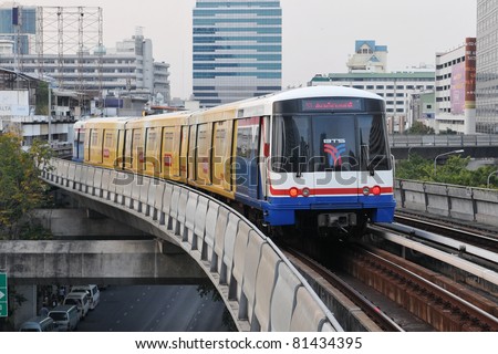 BANGKOK - JAN 13: BTS Skytrain speeds through the city center Jan 13, 2011 in Bangkok, Thailand. The mass transit rail network recently marked its 10th year of service in the Thai capital.