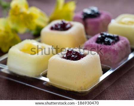Assorted lemon and fruit mini cakes, selective focus