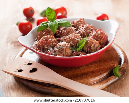 Minced meat ball in tomato saucel, selective focus