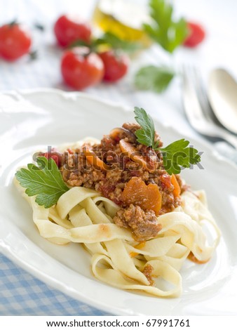 Pasta with meat sauce and parsley