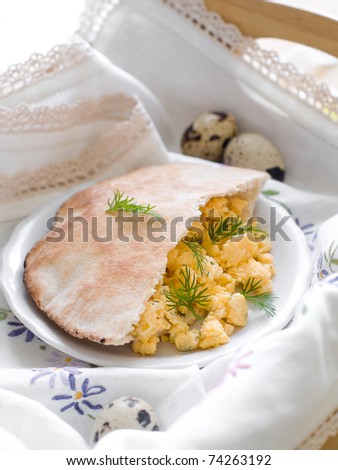 Breakfast omelet in pita bread with dill