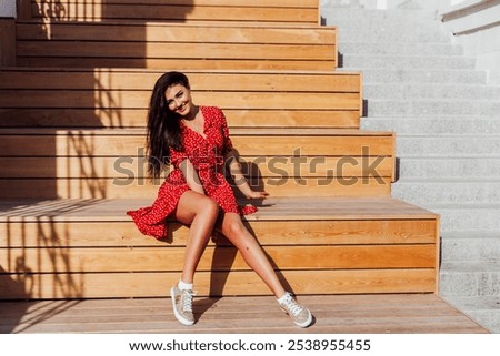 Similar – Image, Stock Photo Light red summer dress with floral pattern in the style of the fifties and sixties in the summer at the flea market at the Golden Oldies in Wettenberg Krofdorf-Gleiberg near Giessen in Hesse