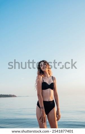 Similar – Image, Stock Photo Slender woman in swimsuit relaxing at poolside