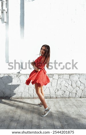 Similar – Image, Stock Photo Light red summer dress with floral pattern in the style of the fifties and sixties in the summer at the flea market at the Golden Oldies in Wettenberg Krofdorf-Gleiberg near Giessen in Hesse