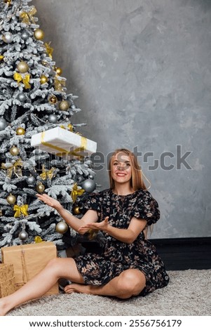 Similar – Image, Stock Photo Beautiful woman decorating hair with copper wreath against plank wall