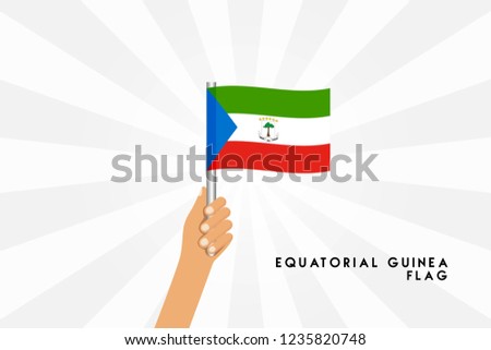 Vector cartoon illustration of human hands hold Equatorial Guinea flag. Isolated object on white background.